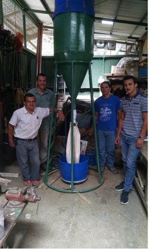 Kevin Orner and Costa Rican collaborators with pilot struvite precipitation reactor